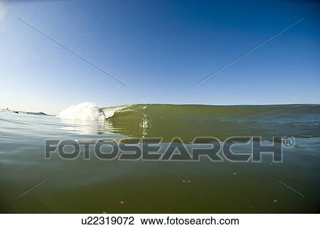 Waves breaking in the ocean View Large Photo Image Stock Image - Waves breaking in the ocean. Fotosearch
