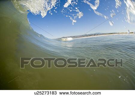 Waves breaking in the ocean View Large Photo Image Stock Image - Waves breaking in the ocean. Fotosearch