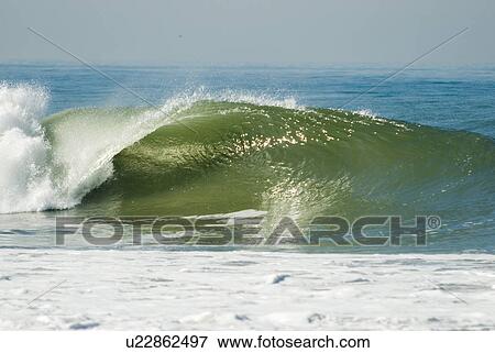 Stock Photo - Waves breaking in the ocean. Fotosearch