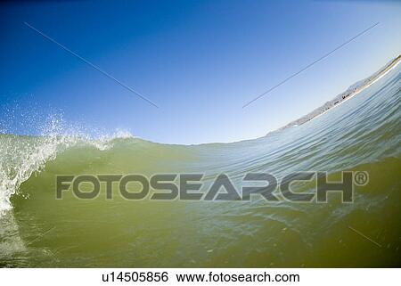 Waves breaking in the ocean View Large Photo Image Stock Photograph - Waves breaking in the ocean. Fotosearch