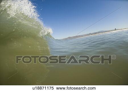 Stock Photography - Waves breaking in the ocean. Fotosearch