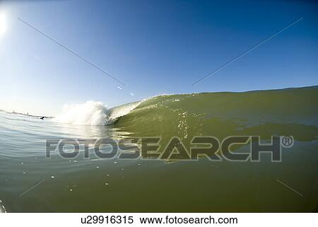 Waves breaking in the ocean View Large Photo Image Stock Photography - Waves breaking in the ocean. Fotosearch