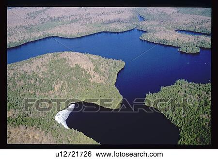 Aerial view of river in forest View Large Photo Image Stock Photograph - Aerial view of river in forest. Fotosearch