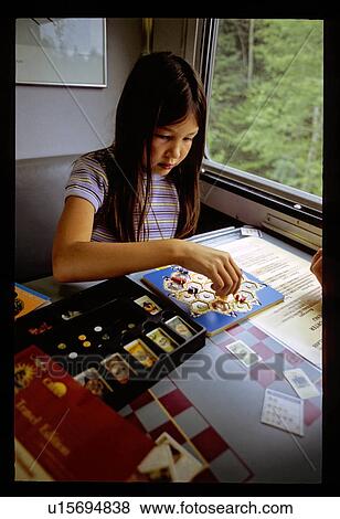 Boardgames on a train View Large Photo Image Stock Photo - Boardgames on a train. Fotosearch