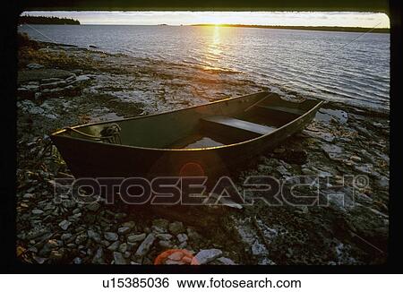 Boat on a coastline View Large Photo Image Stock Photograph - Boat on a coastline. Fotosearch