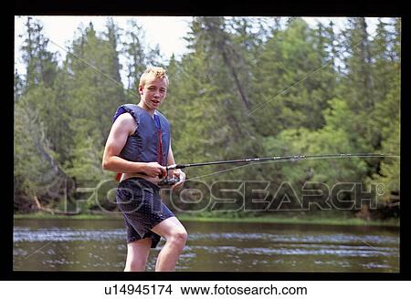 Picture - Boy fishing. Fotosearch