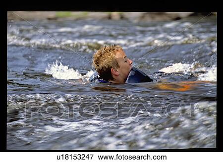 Boy swimming View Large Photo Image Stock Photo - Boy swimming. Fotosearch