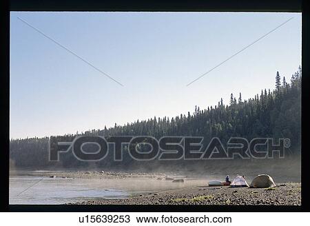Stock Image - Camping at the lake. Fotosearch