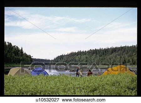 Stock Photo - Camping at the lake. Fotosearch