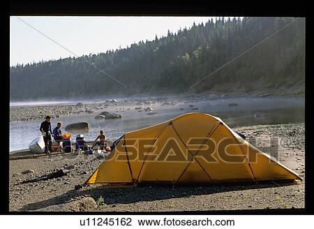 Stock Image - Camping on beach. Fotosearch