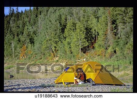 Stock Image - Camping on beach. Fotosearch