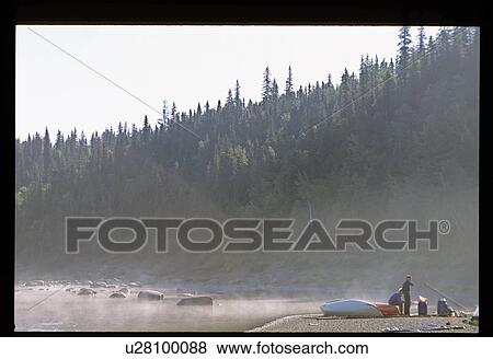 Canoe on the shore View Large Photo Image Stock Photo - Canoe on the shore. Fotosearch