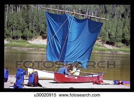 Canoe with sails View Large Photo Image Stock Photography - Canoe with sails. Fotosearch