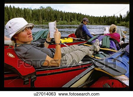 Canoeing and relaxing View Large Photo Image Stock Image - Canoeing and relaxing . Fotosearch