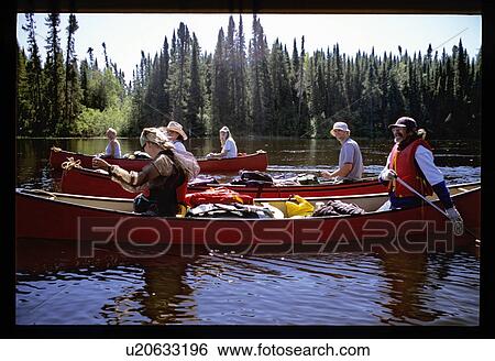 Stock Photograph - Canoeing as a group. Fotosearch