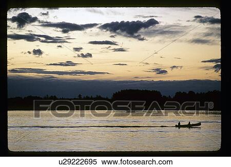 Canoeing at sunset View Large Photo Image Stock Photography - Canoeing at sunset. Fotosearch