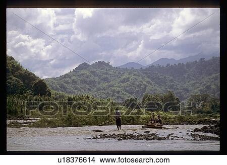 Canoeing by mountains View Large Photo Image Picture - Canoeing by mountains . Fotosearch