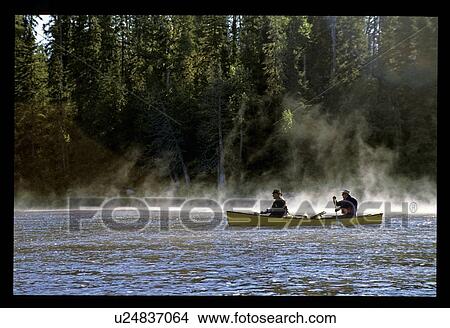 Picture - Canoeing in the mist . Fotosearch