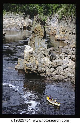 Canoeing on river View Large Photo Image Picture - Canoeing on river. Fotosearch