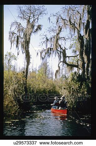 Stock Photo - Canoeing on river. Fotosearch