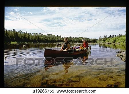 Canoeing up a river View Large Photo Image Stock Photography - Canoeing up a river. Fotosearch