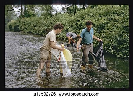 Stock Photograph - Cleaning up the river. Fotosearch