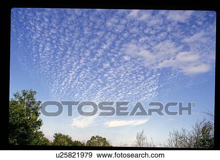 Clouds in the sky View Large Photo Image Stock Photo - Clouds in the sky. Fotosearch