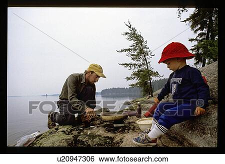 Cooking on a hill View Large Photo Image Stock Photograph - Cooking on a hill. Fotosearch