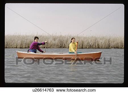 Couple canoeing View Large Photo Image Stock Image - Couple canoeing . Fotosearch
