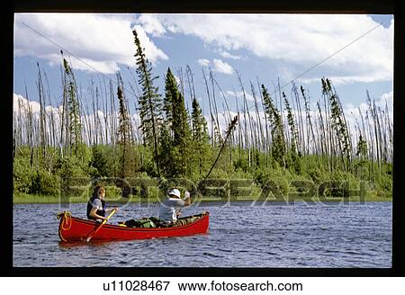 Stock Photo - Couple canoeing. Fotosearch