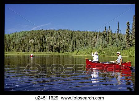 Stock Photo - Couple canoeing. Fotosearch