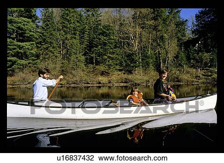 Stock Image - Family canoeing . Fotosearch