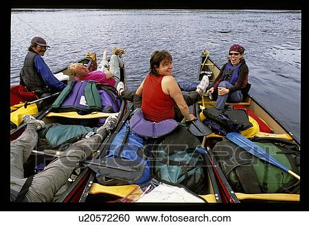 Family canoeing View Large Photo Image Stock Image - Family canoeing. Fotosearch