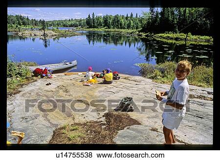Family canoeing View Large Photo Image Stock Photo - Family canoeing . Fotosearch