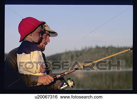 Stock Photograph - Father and son fishing. Fotosearch