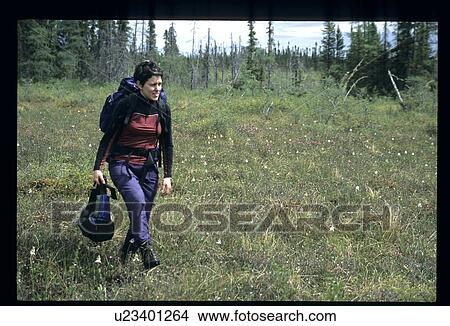 Picture - Female hiker. Fotosearch