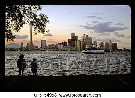 Ferry in front of city View Large Photo Image Stock Photo - Ferry in front of city . Fotosearch