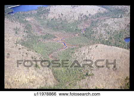Stock Photograph - Flying over a river. Fotosearch