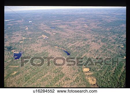 Stock Image - Flying over land. Fotosearch