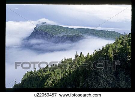 Stock Photo - Fog coming a shore. Fotosearch