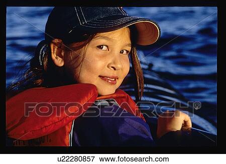 Girl in a boat View Large Photo Image Stock Photo - Girl in a boat. Fotosearch