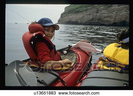 Girl in kayak View Large Photo Image Stock Image - Girl in kayak. Fotosearch