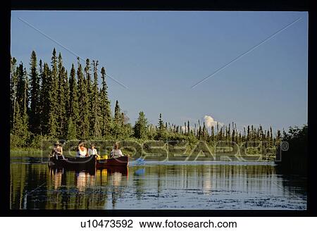 Stock Image - Group canoeing . Fotosearch