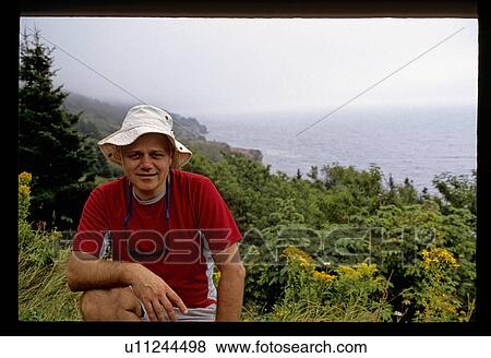 Stock Photo - Hiker taking a break. Fotosearch