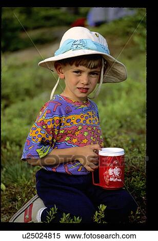 Holding a cup View Large Photo Image Stock Photography - Holding a cup. Fotosearch