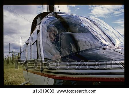 Stock Image - Looking into a helicopter . Fotosearch