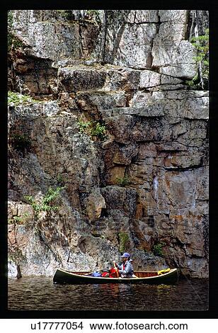 Picture - Man canoeing. Fotosearch