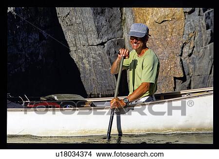 Man canoeing View Large Photo Image Picture - Man canoeing . Fotosearch