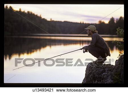 Man fishing View Large Photo Image Stock Image - Man fishing. Fotosearch
