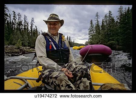 Man rafting View Large Photo Image Stock Image - Man rafting . Fotosearch